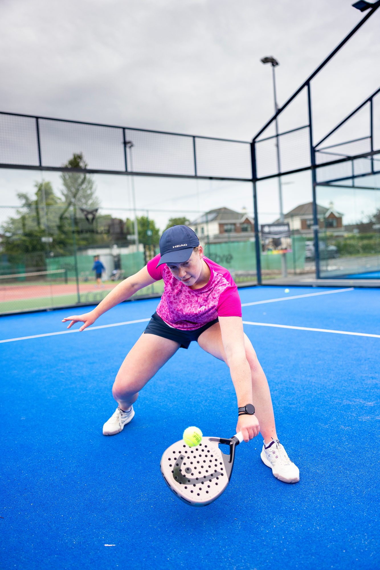 Anna Zuka getting low to dig out a backhand